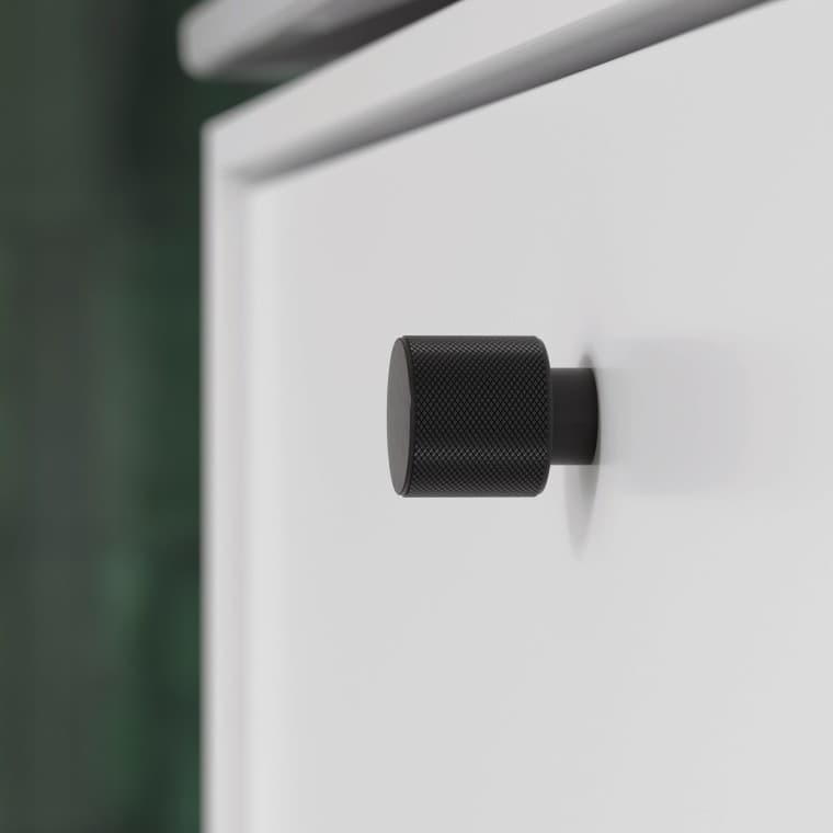 Ifö Sense Art badrumsmöbler med svart knopp som grepp Ifö Sense Art badrumsmöbler med svart knopp som grepp